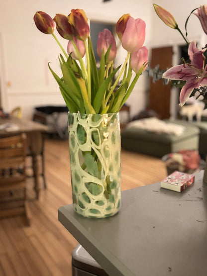 Green and white flower vase