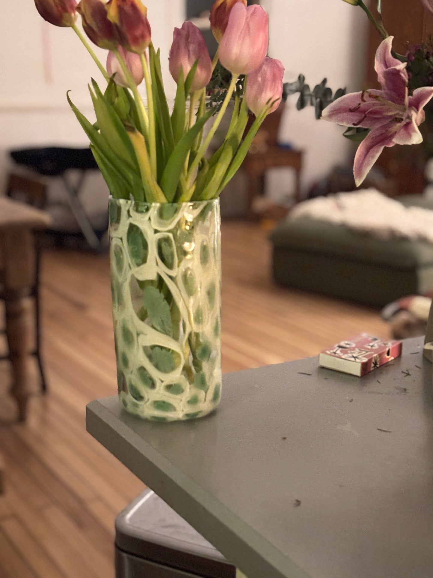 Green and white flower vase