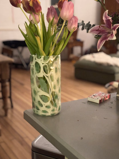 Green and white flower vase