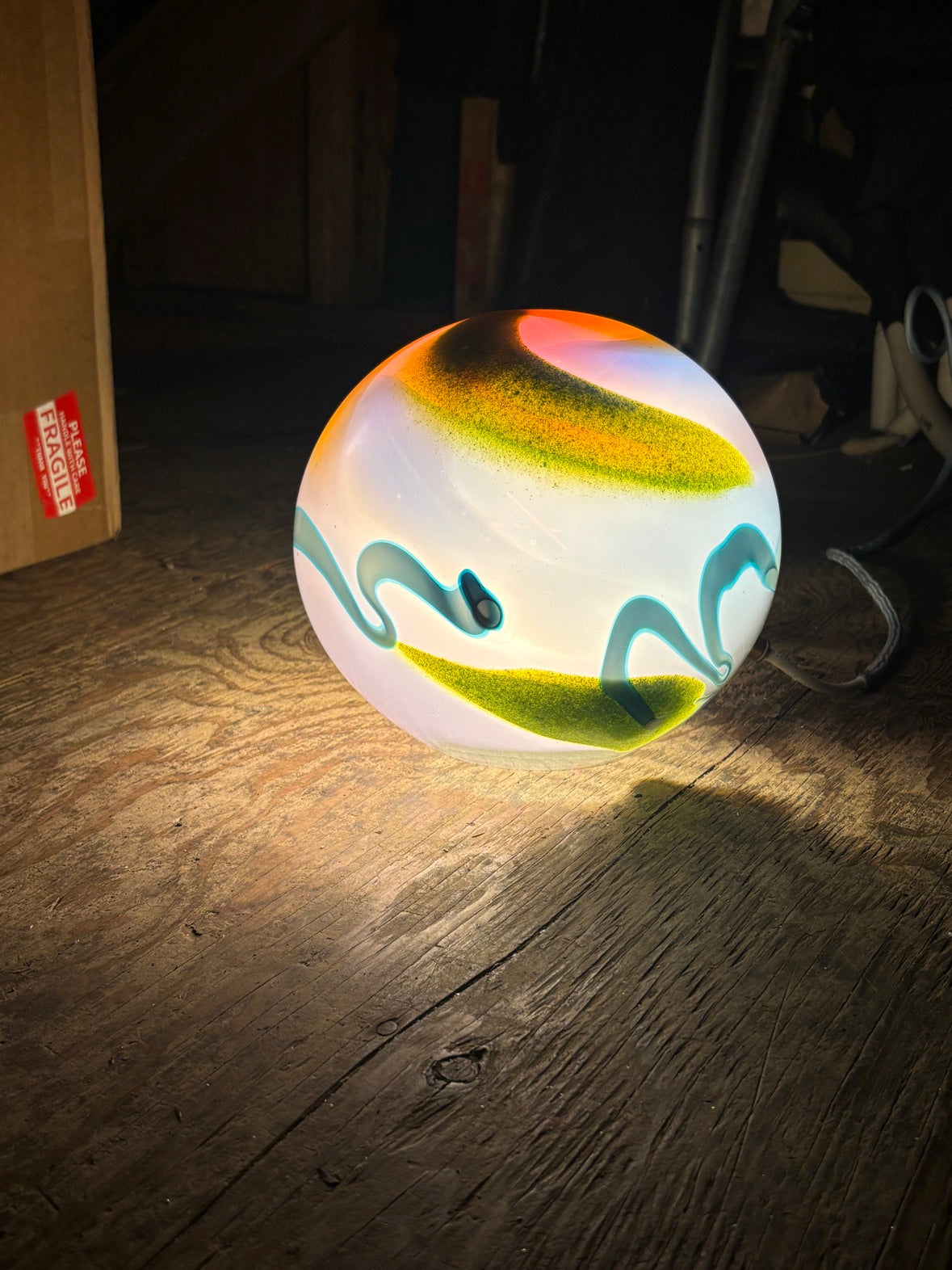 Wild Light desk lamp — front view, lit
