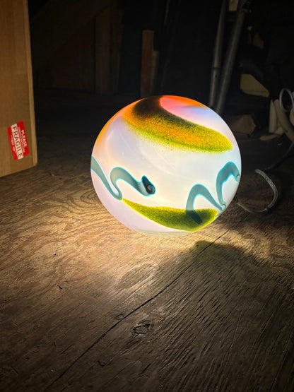 Wild Light desk lamp — front view, lit
