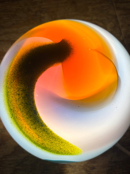 Wild Light — orange swirl top view